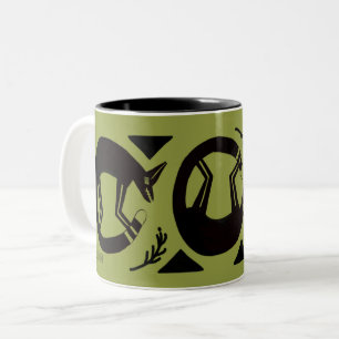 Ancient foxes and flowers on green mug