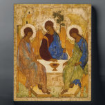 Andrei Rublev Holy Trinity Icon Orthodox religion Plaque<br><div class="desc">The Holy Trinity Icon (aka 'The Hospitality of Abraham') is a panel painting created by Andrei Rublev (c.1360-1430) in the early 15th century. Probably the most famous of all Russian religious paintings,  it represents one of the highpoints of Russian art of the late Mediaeval era.</div>