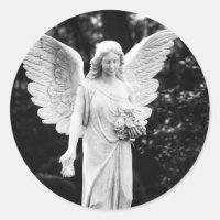 Angel holding flowers black and white photography