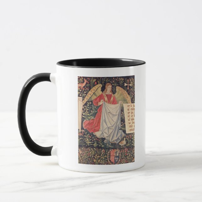 Angel holding the shroud mug (Left)