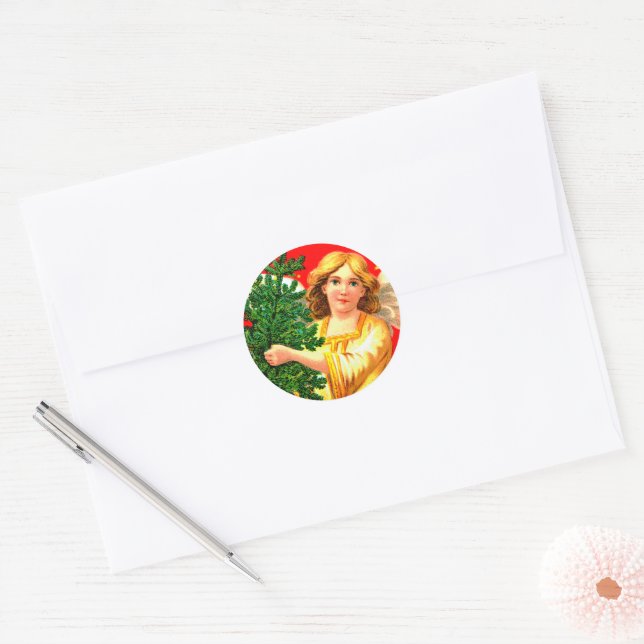 Angel in Yellow Carrying Xmas Tree  Classic Round Sticker (Envelope)