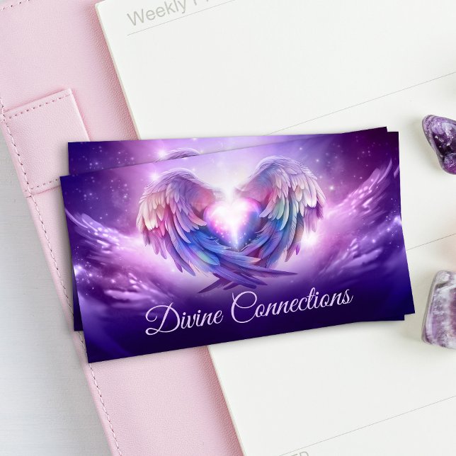 Angel wings gently embracing the heart business card (Creator Uploaded)