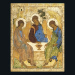 Angels At Mamre Trinity Photo Print<br><div class="desc">mediaeval christian painting by andre rublev of his  interpretation of the trinity with three angels with golden wings,   halo,  green,  red,  and gold cloaks,  sitting together around a  table. illustrative fine art in   golds and greens,  in a delicate and refined  religious painting.</div>