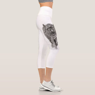 Angry Black Wolf in the Snow , wild Winter Capri Leggings