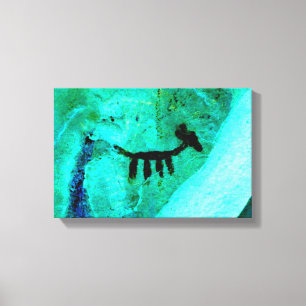 animal petroglyph on green wrapped canvas
