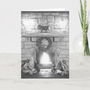 Annice and Margot Belden sitting by fireplace at Holiday Card