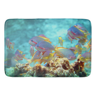 Anthias - Colourful school of fish at coral reef Bath Mat