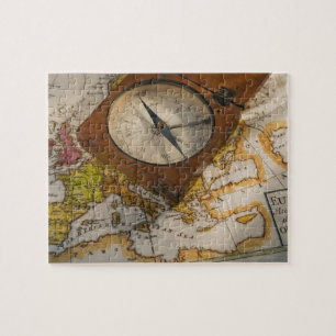 Antique compass on map jigsaw puzzle