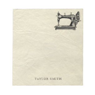Antique sewing machine with name notepad