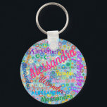 Any Name Collage Girly Keychain with Flowers<br><div class="desc">These fun keychains feature a colourful girly design personalised with the name of your choice appearing in numerous different fonts and colours. The names are displayed over a blue background with multi-coloured flowers. Great gift or favour for a girl's birthday party, or any time you want a fun keychain with...</div>