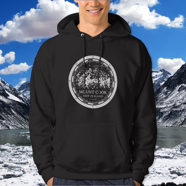 Aoraki Mount Cook - Canterbury New Zealand Hoodie (Mount Cook New Zealand Hoodie in Back with a white compass and mountain illustration)