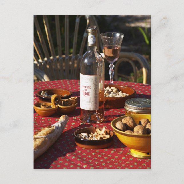 Aperitif and appetizers prepared: bread, olives, postcard (Front)