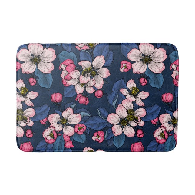 Apple blossom on a dark blue bath mat (Front)