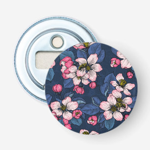 Apple blossom on a dark blue bottle opener