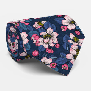 Apple blossom on a dark blue tie