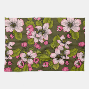 Apple blossom on dark green tea towel
