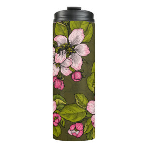 Apple blossom on dark green thermal tumbler