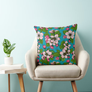 Apple blossom on turquoise cushion