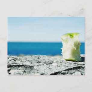 Apple core in the dirt postcard
