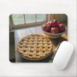 Apple Pie By a Sunny Farmhouse Window Mouse Pad<br><div class="desc">A baked apple pie, adorned with a beautiful lattice crust and charming star designs, resting invitingly on a wooden table beside a sunlit farmhouse window</div>