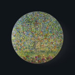 Apple Tree by Gustav Klimt, Vintage Art Nouveau 6 Cm Round Badge<br><div class="desc">Apple Tree (1912) by Gustav Klimt is a vintage Victorian Era Symbolism fine art painting. A nature scene with an apple tree in an orchard on a farm with ripe fruit and apple blossoms. The floral garden is in full bloom with spring flowers. About the artist: Gustav Klimt (1862-1918) was...</div>