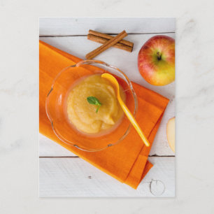 Applesauce with cinnamon and orange spoon postcard