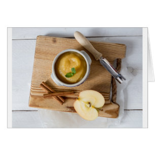 Applesauce with cinnamon in stoneware bowl