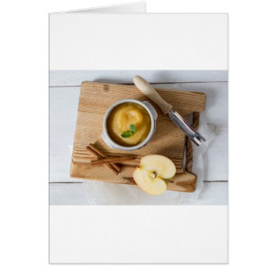 Applesauce with cinnamon in stoneware bowl