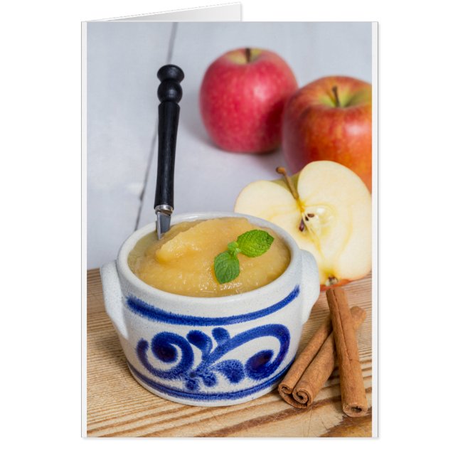 Applesauce with cinnamon in stoneware bowl (Front)