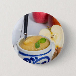 Applesauce with cinnamon in stoneware bowl 6 cm round badge