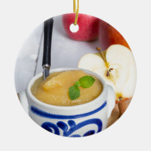 Applesauce with cinnamon in stoneware bowl ceramic tree decoration