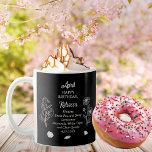 April Daisy and SweetPea Birthday Keepsake Coffee Mug<br><div class="desc">April actually has two flowers in celebration of birthdays for this month: daisies and sweetpeas. This design features both The gemstone for April is the diamond, but white topaz and clear quartz are also included. This design features all details in white on a black background. We have paired it with...</div>
