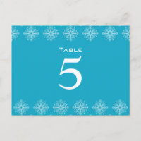 Aqua blue + white snowflakes wedding table number