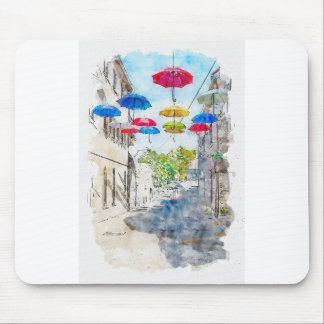 Aquarelle sketch art. Street with multicolored umb Mouse Pad