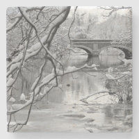 Arch Bridge over Frozen River in Winter