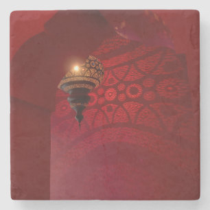 Arched entrance and illuminated lantern stone coaster