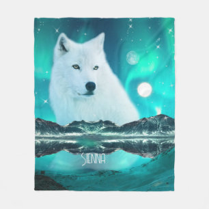 Arctic wolf and magical night with northern lights fleece blanket