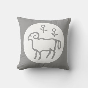 Aries astrology on grey pillow