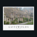 Arlington Row houses, Bibury in the Cotwolds Postcard<br><div class="desc">Photo postcard of the Arlington Row,  honey-coloured weavers cottages in the morning fog in the town of Bibury,  the Cotswolds in England,  UK with a white edge and the text 'Cotswolds,  England'.</div>