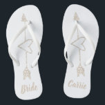 Arrow Heart Brides Wedding Flip Flops<br><div class="desc">White bride's flip flops with graphics of a champagne glitter looking heart outline,  with an arrow going through it.  Custom tan text is fully customisable to suit your needs.</div>
