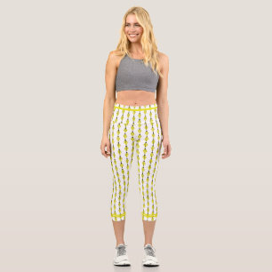 Art deco element in yellow capri leggings
