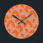 Art Deco Puzzle  Round Clock<br><div class="desc">This clock has an art deco design of squares divided in half by diagonal lines of silver. The squares are then pieced together on a field of orange.</div>