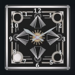 Art Deco Square Wall Clock<br><div class="desc">With a nod to the art deco era, your decor will display an elegance from days gone by. Bold, striking colours will compliment many design tastes.</div>