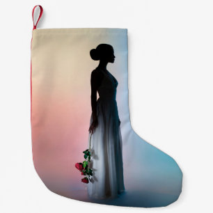 Art fashion studio photo of beautiful elegant woma small christmas stocking