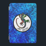 Art Gecko  iPad Mini Cover<br><div class="desc">Art Gecko
This phone case is decorated with a beautiful sparkling multicolor gecko silhouette in a circle. The background is a glitter blue pattern reminding water.
The funny text saying “Art Gecko” is a reference to “Art Deco”,  you can customise it as you want.</div>
