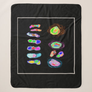 Art puffs and fluffs on a black backdrop sherpa blanket