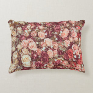 Artificial flowers, beautiful cloth background. decorative cushion