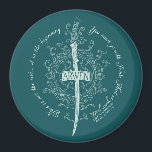 ARWEN™ Elven Sword Quote Magnet<br><div class="desc">Honor the strength and grace of Arwen™ with this striking Lord of the Rings™ design inspired by the Elves. Centered around an elegant Elven sword framed by intricate, flowing vinework, the artwork beautifully reflects her courage, devotion, and timeless spirit. The circular quote, “This is not the end… it is the...</div>