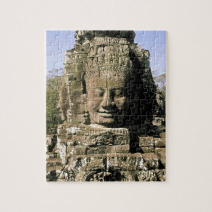 Asia, Cambodia, Siem Reap. Angkor Thom, heads of Jigsaw Puzzle