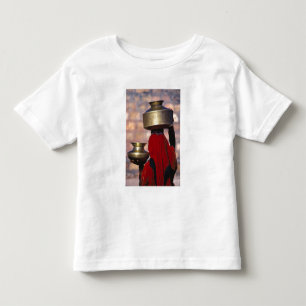 Asia, India, Rajasthan. A local woman in a red Toddler T-Shirt